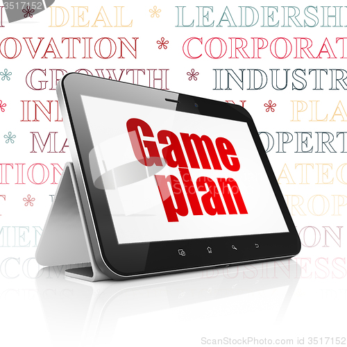 Image of Business concept: Tablet Computer with Game Plan on display
