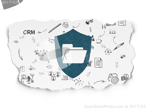 Image of Business concept: Folder With Shield on Torn Paper background