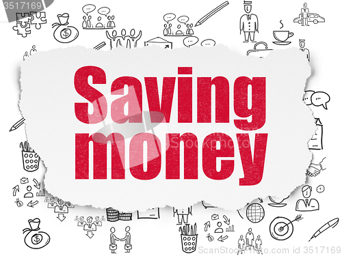 Image of Business concept: Saving Money on Torn Paper background