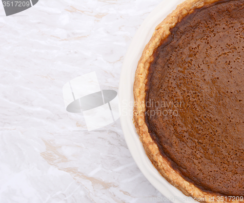 Image of Homemade pumpkin pie with copy space