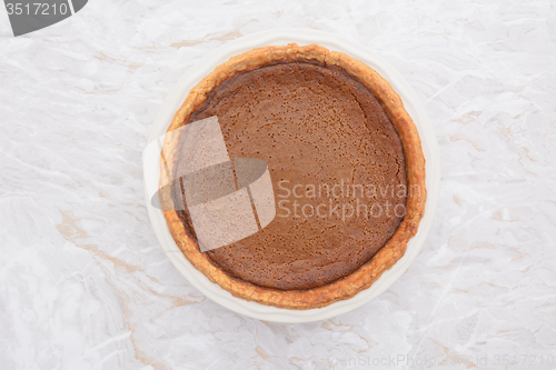 Image of Thanksgiving pumpkin pie fresh from the oven