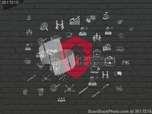 Image of Business concept: Shield on wall background