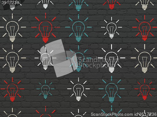Image of Finance concept: Light Bulb icons on wall background