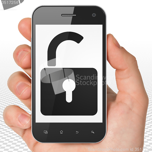 Image of Privacy concept: Hand Holding Smartphone with Opened Padlock on display