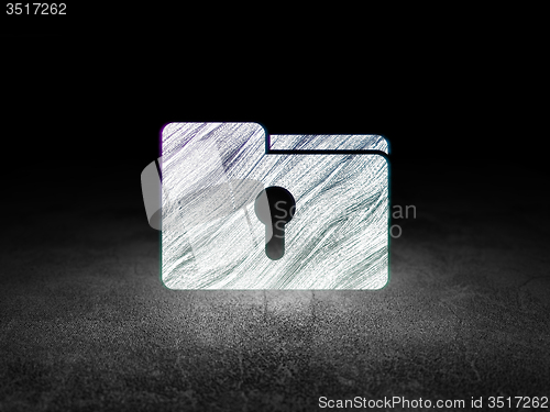 Image of Business concept: Folder With Keyhole in grunge dark room