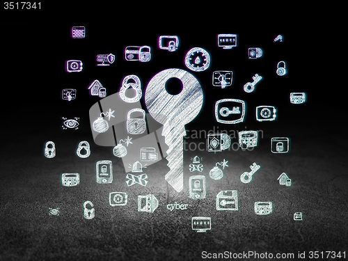 Image of Security concept: Key in grunge dark room