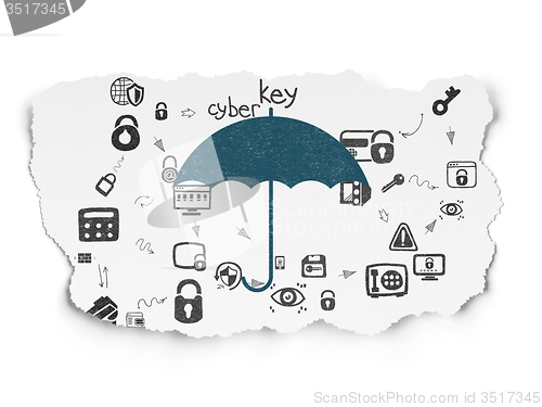 Image of Safety concept: Umbrella on Torn Paper background