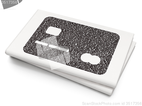 Image of Currency concept: Credit Card on Blank Newspaper background