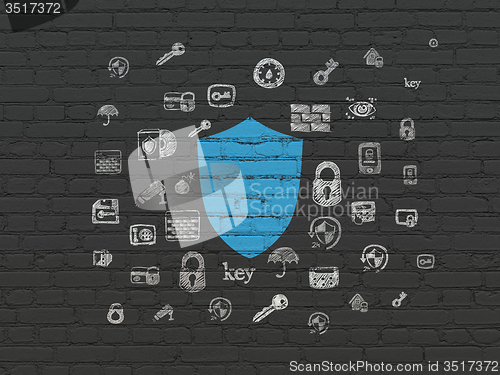 Image of Security concept: Shield on wall background