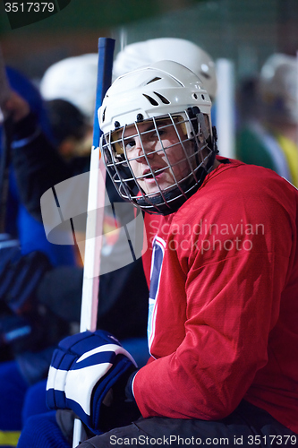 Image of ice hockey players on bench