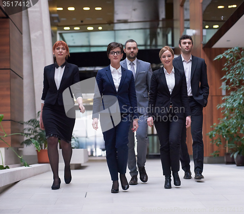 Image of business people team walking