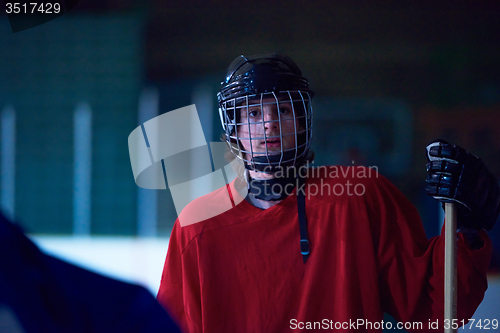 Image of ice hockey players on bench