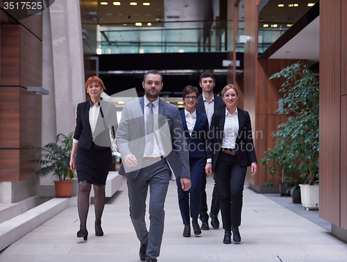 Image of business people team walking