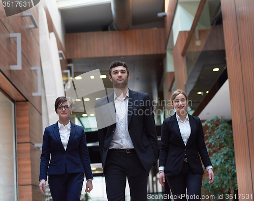 Image of business people team walking