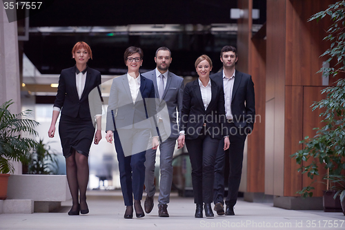 Image of business people team walking