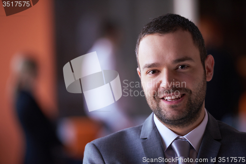 Image of young business man portrait  at modern office