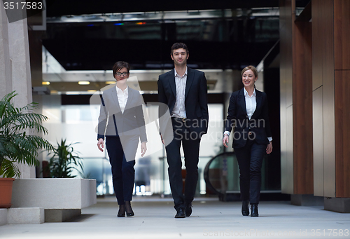 Image of business people team walking