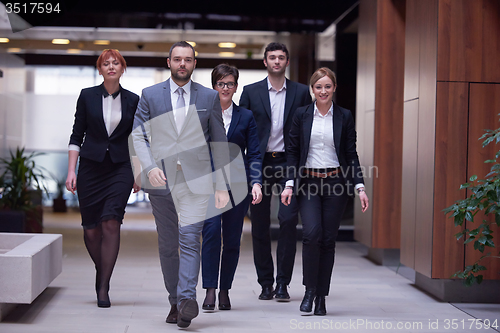 Image of business people team walking