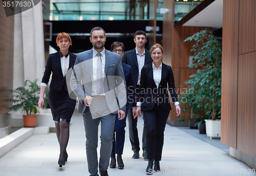 Image of business people team walking