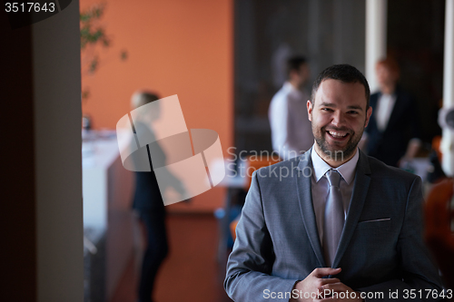 Image of young business man portrait  at modern office