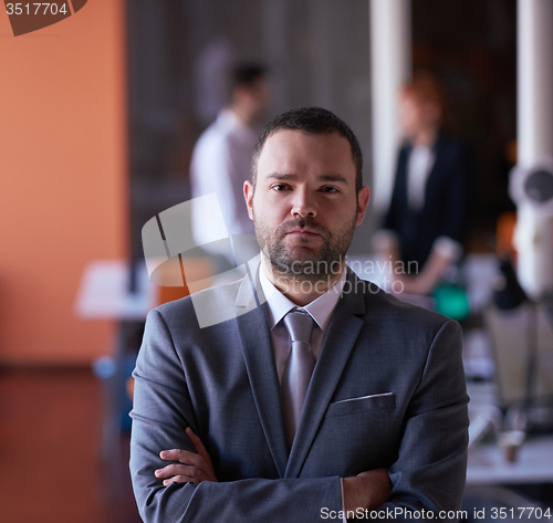 Image of young business man portrait  at modern office