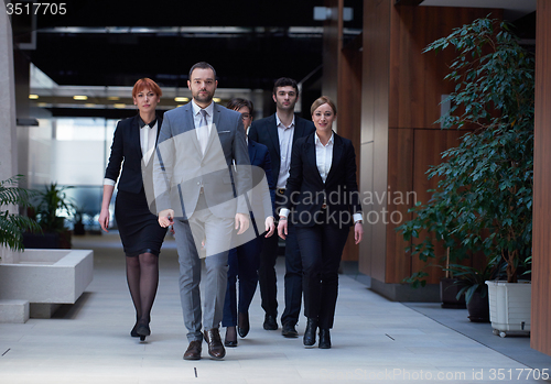 Image of business people team walking