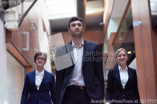Image of business people team walking