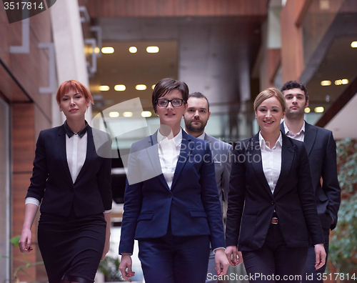 Image of business people team walking