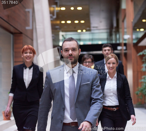 Image of business people team walking