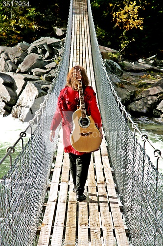 Image of Woman with guitar