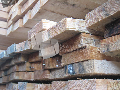 Image of Redwood boards with stain.