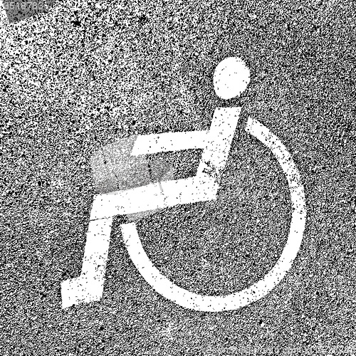 Image of Parking places with disabled signs  on asphalt. 