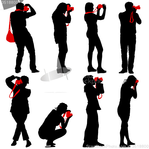 Image of Cameraman with video camera. Silhouettes on white background. 