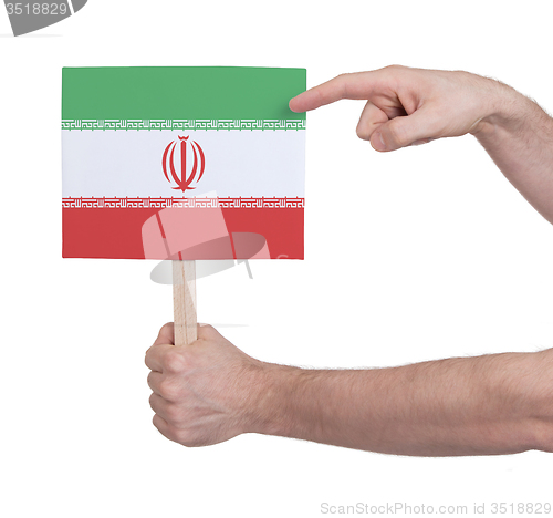 Image of Hand holding small card - Flag of Iran