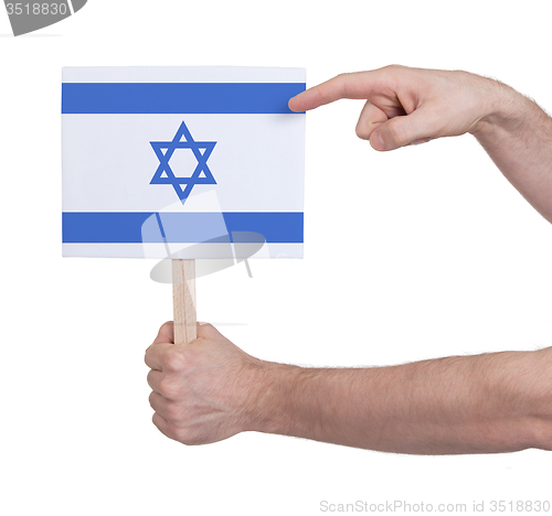 Image of Hand holding small card - Flag of Israel