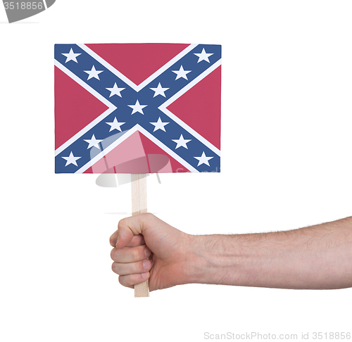 Image of Hand holding small card - Flag of the Confederacy