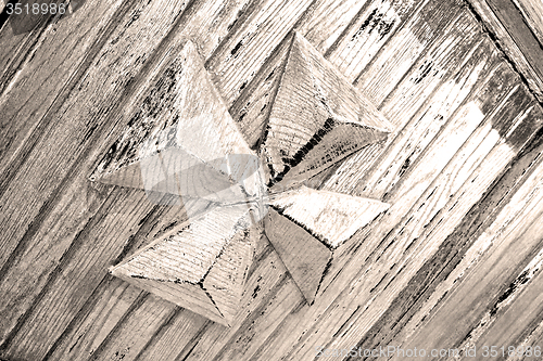 Image of grain texture of a brown antique wooden old door in italy   euro