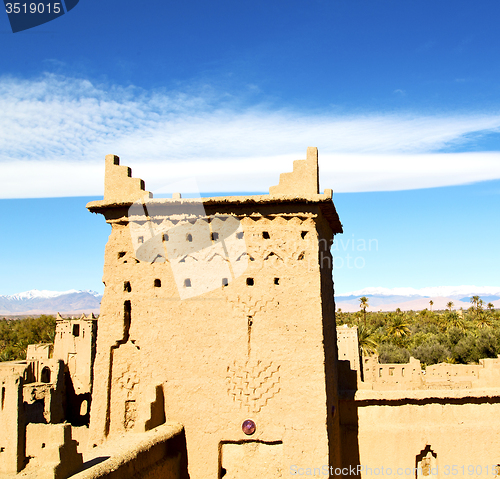 Image of brown old construction in africa morocco and red leather near th