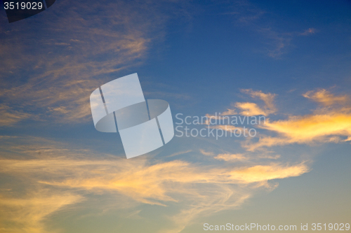 Image of the sunrise in  colored sky white soft clouds and abstract 