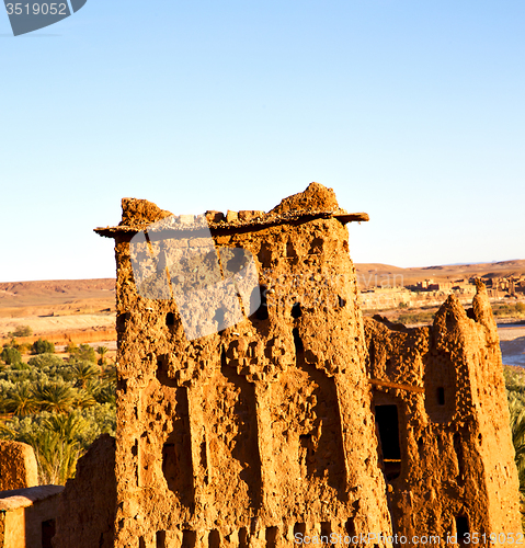 Image of africa  in histoycal maroc  old construction  and the blue cloud