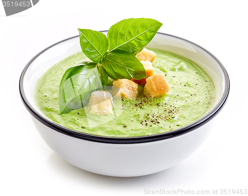 Image of bowl of broccoli and green peas cream soup