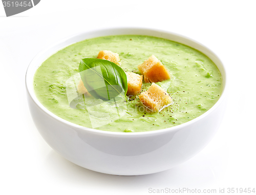 Image of bowl of broccoli and green peas cream soup