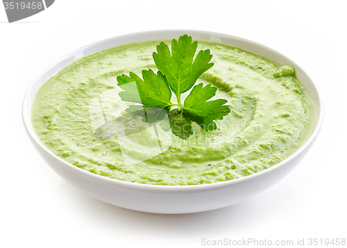 Image of bowl of broccoli and green peas cream soup