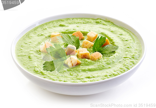 Image of bowl of broccoli and green peas cream soup