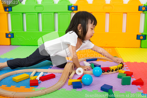 Image of Asian Chinese children playing with blocks