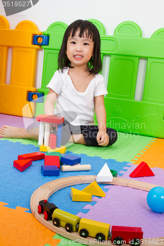 Image of Asian Chinese children playing with blocks
