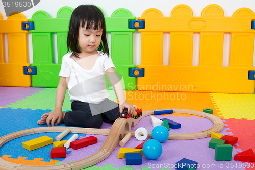 Image of Asian Chinese children playing with blocks