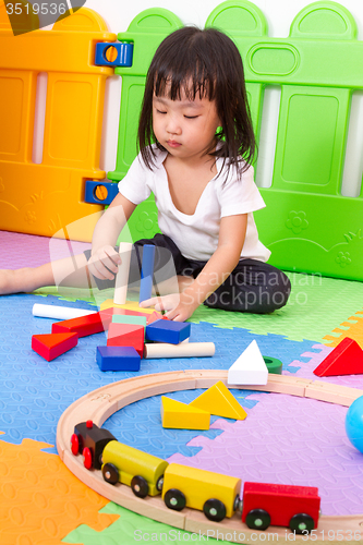 Image of Asian Chinese children playing with blocks