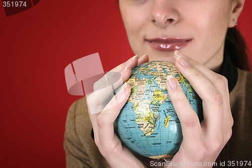 Image of Globe in a girl's hands