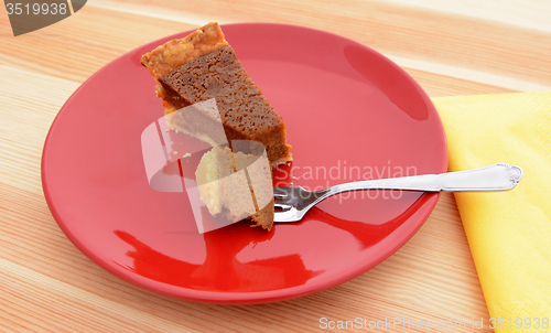 Image of Bite of pumpkin pie on a fork